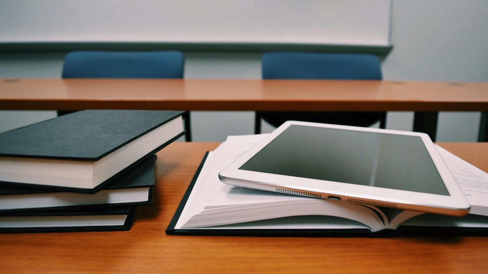 silver-ipad-on-top-of-school-books