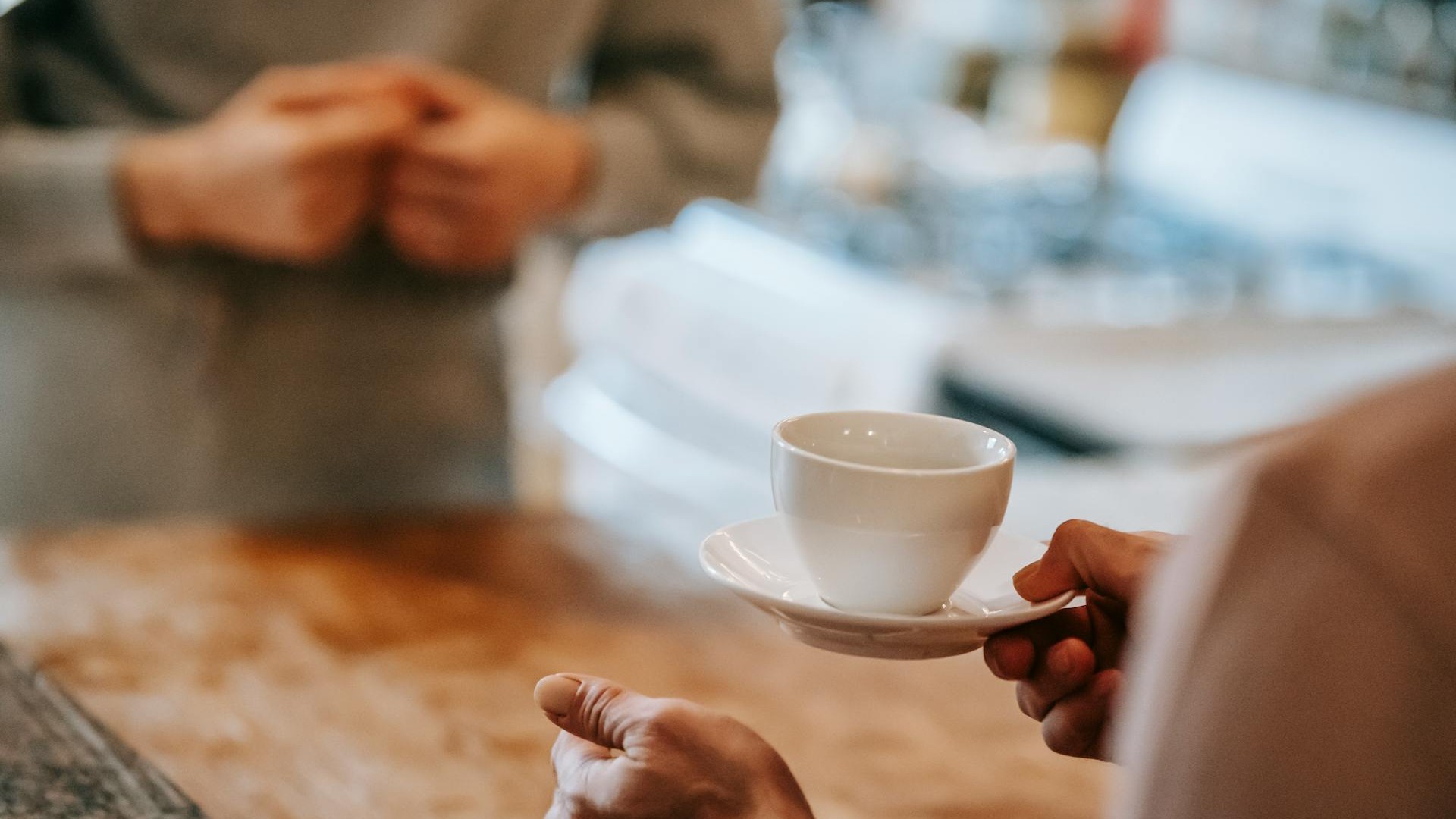two-anonymous-people-having-coffee